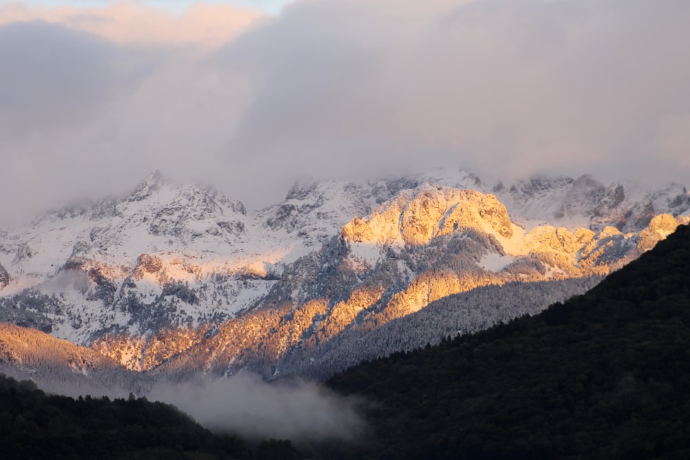 snow covered mountain during daytime