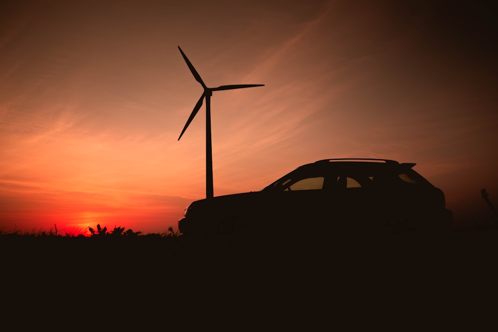 silhouette of car during sunset