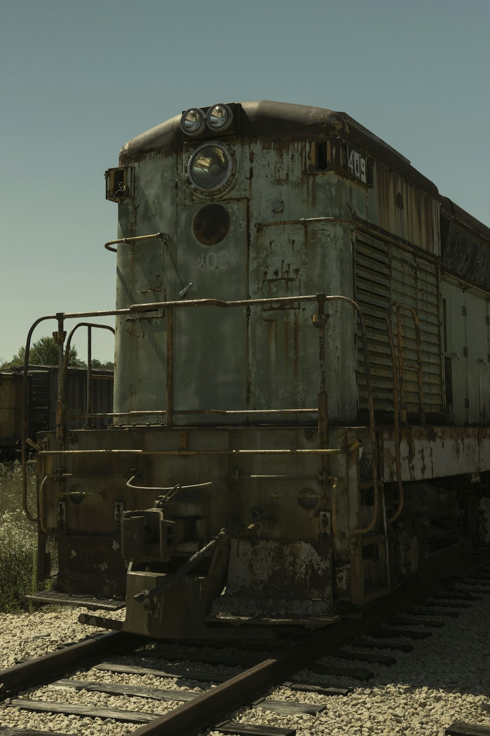 brown train on rail tracks during daytime