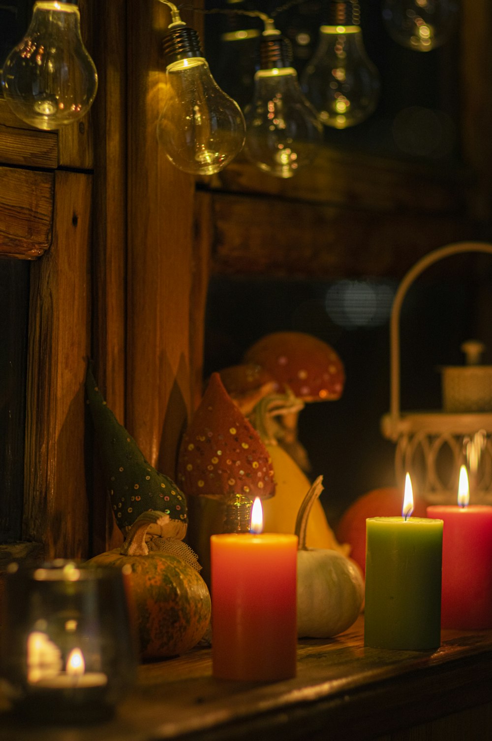 lighted candles on brown wooden table