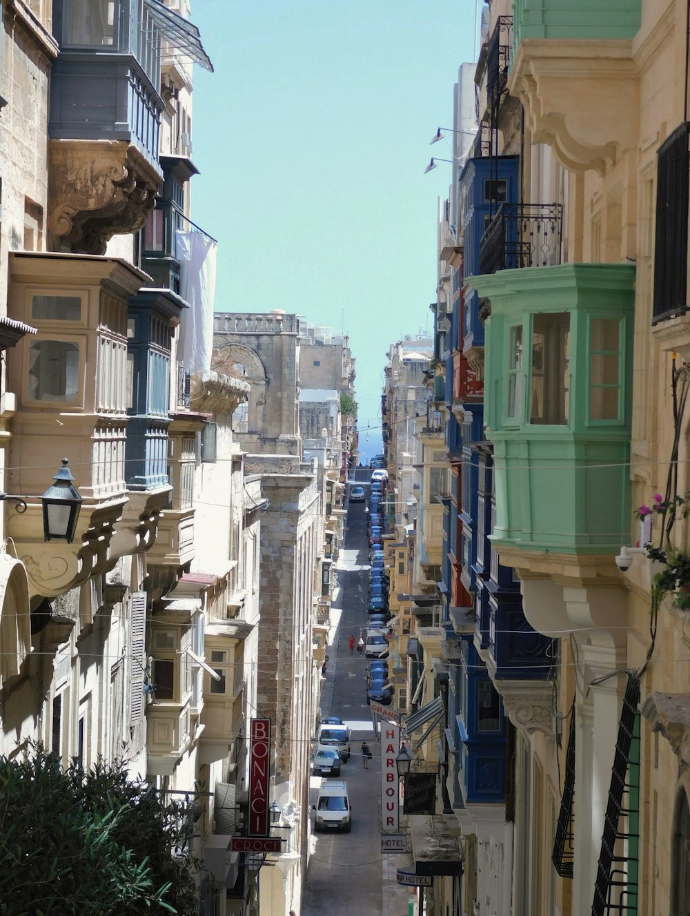 white and green concrete buildings during daytime