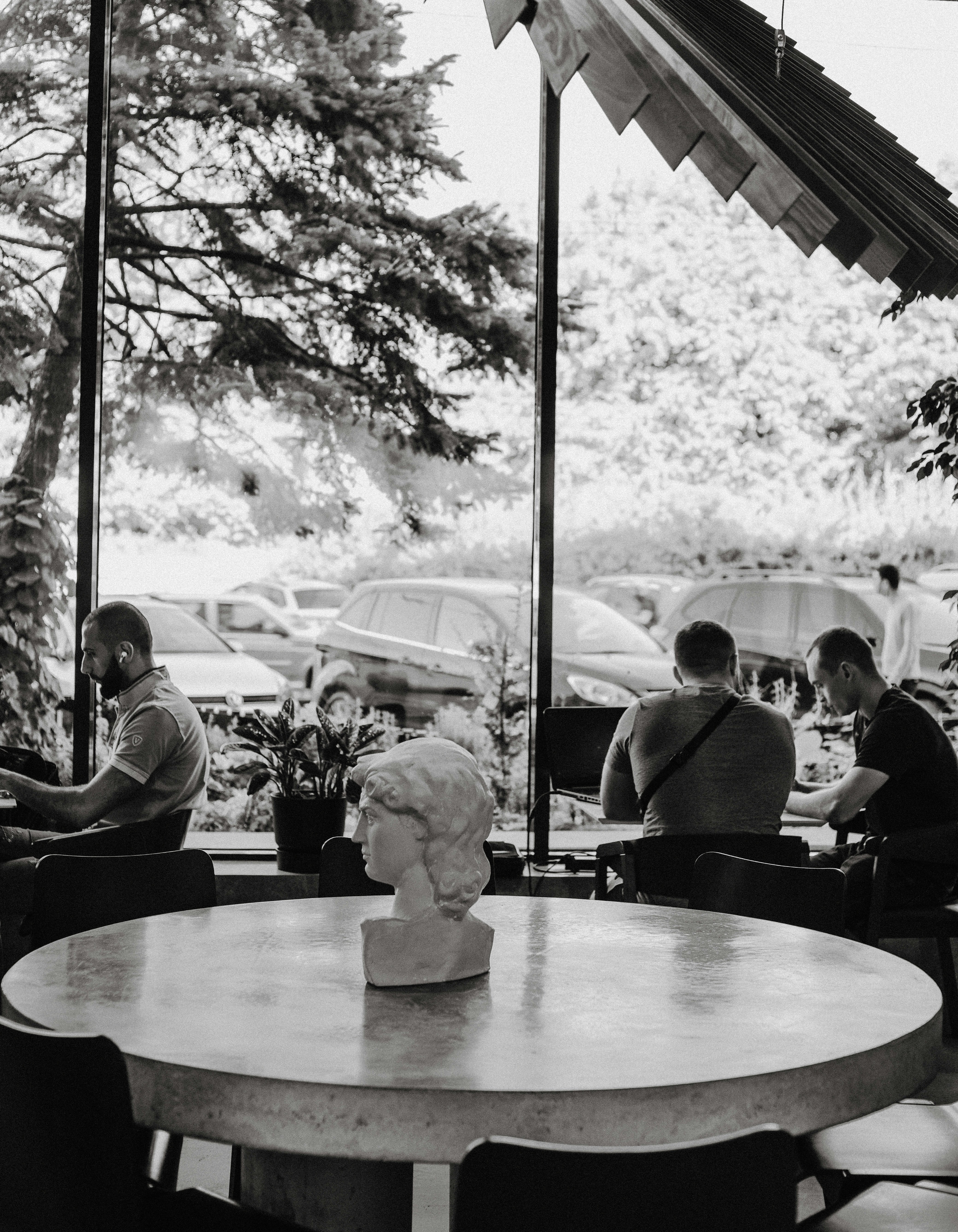 People sitting on chair near table during daytime photo – Free Grey ...