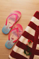 pink and white stripe flip flops