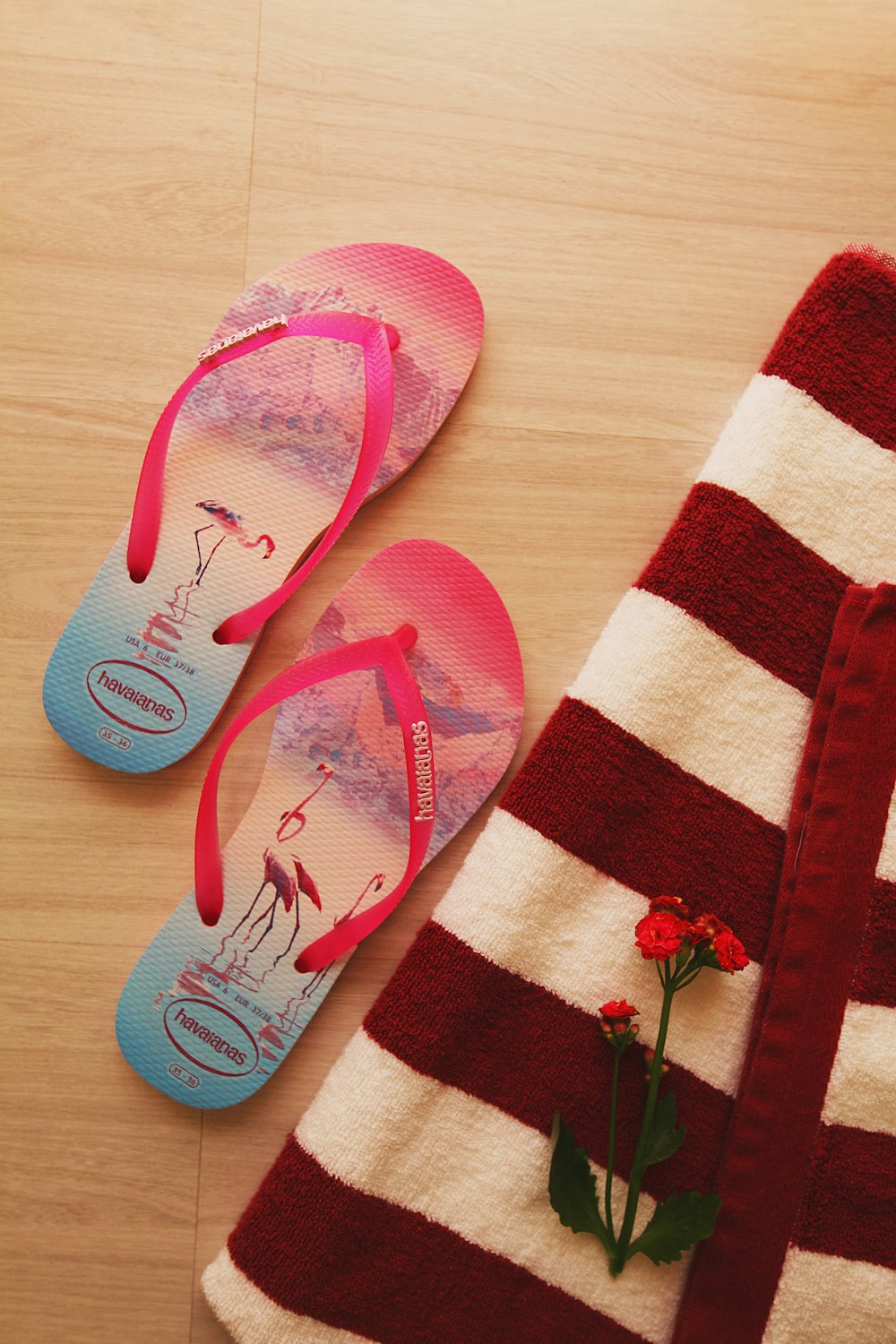 pink and white stripe flip flops