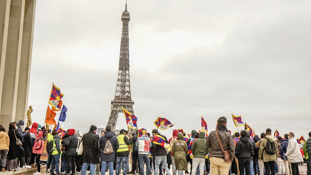 people gathering near eiffel tower during daytime