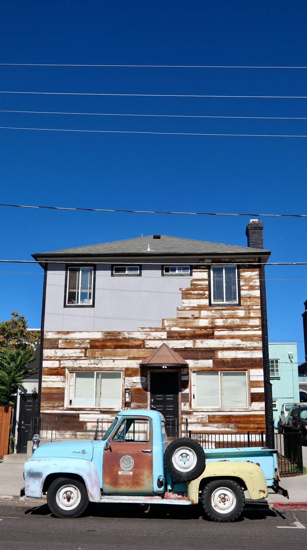 white and brown concrete house under blue sky during daytime