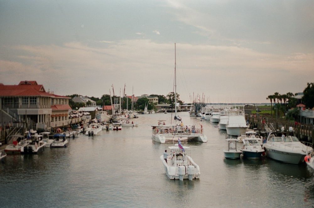 a group of boats that are sitting in the water