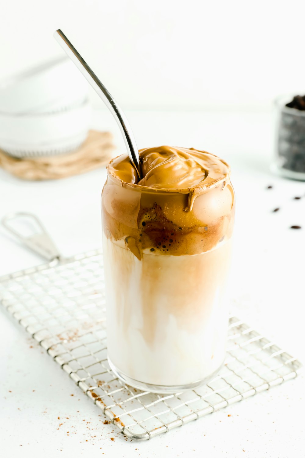 clear drinking glass with brown liquid