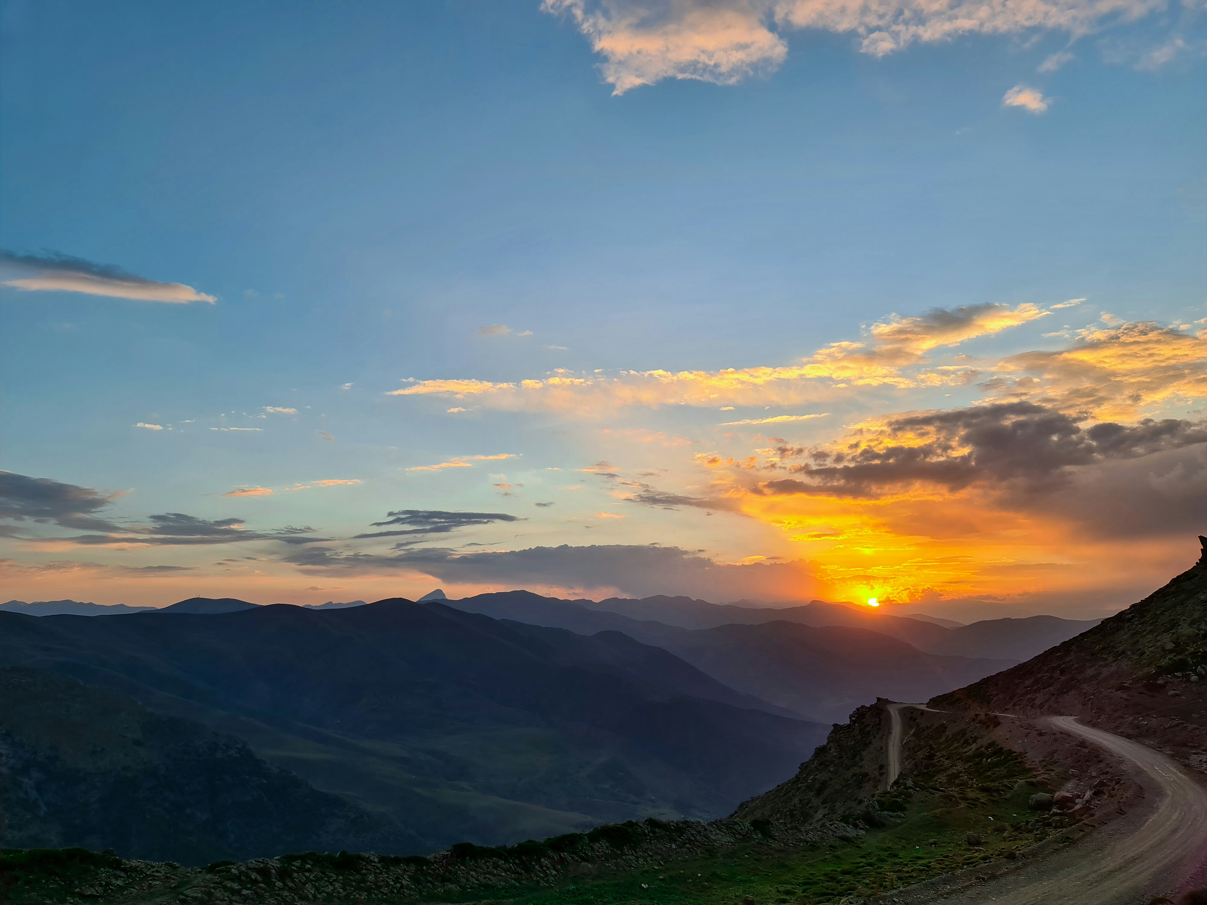 green mountains under white clouds during daytime, 