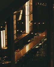 A welcoming bar area with a variety of crafted drinks and warm ambient lighting.