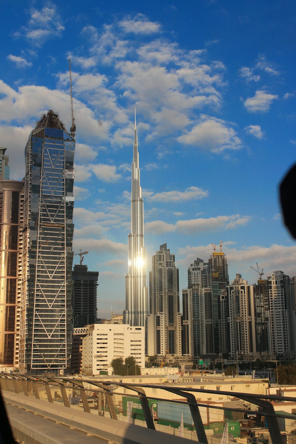 white and brown high rise buildings under blue sky during daytime