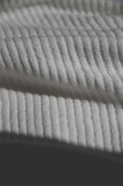 white textile in close up photography