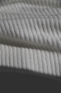 white textile in close up photography
