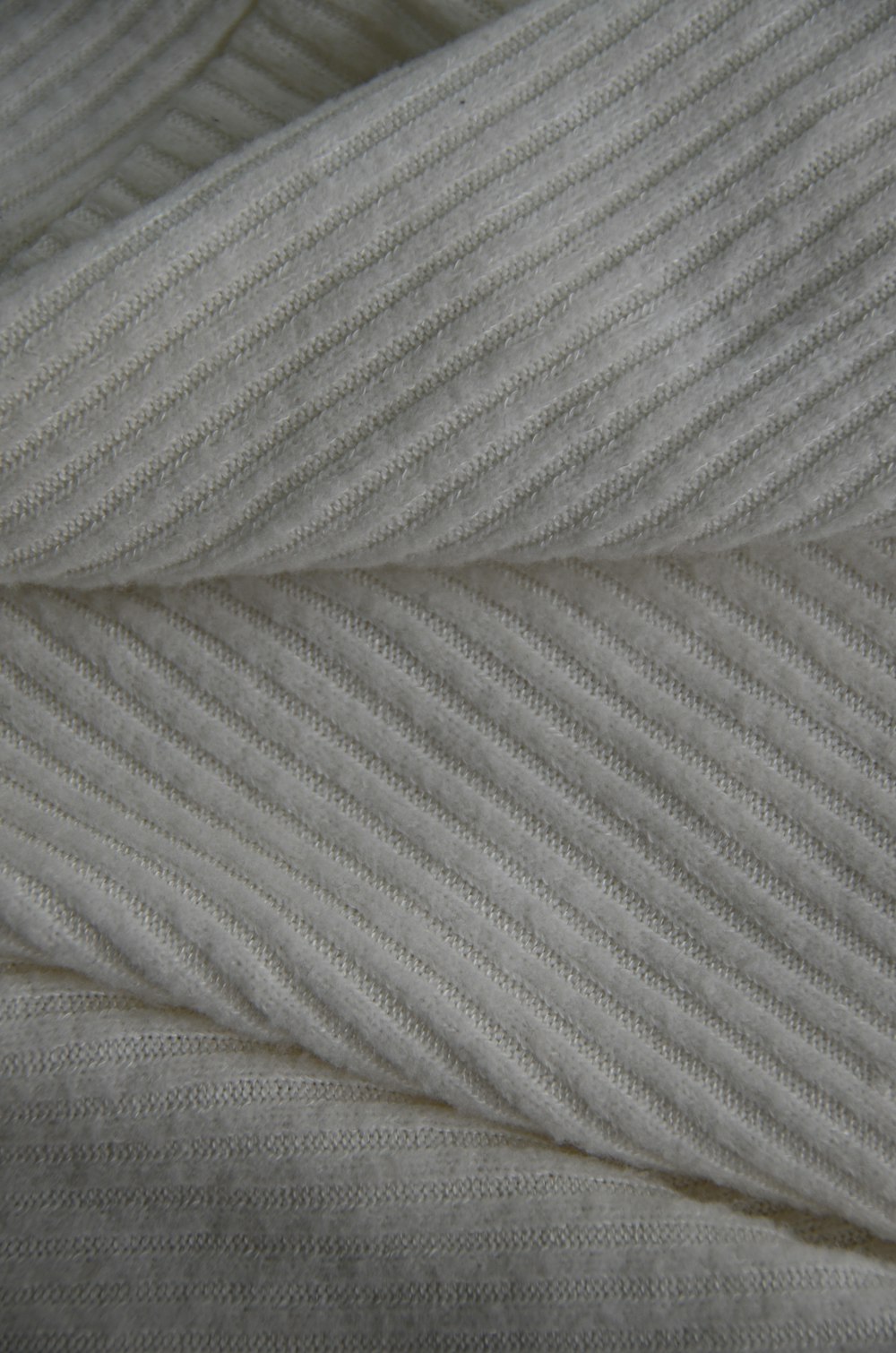 white and gray striped textile