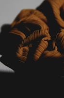 Close-up of stylish fabric textures and patterns on folded garments.