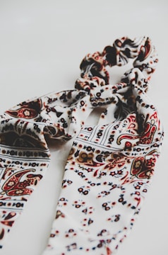 A beautifully draped silk scarf showcasing intricate patterns.