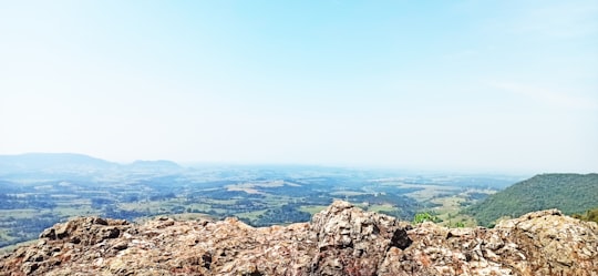 brown rocky mountain under blue sky during daytime in Botucatu Brasil