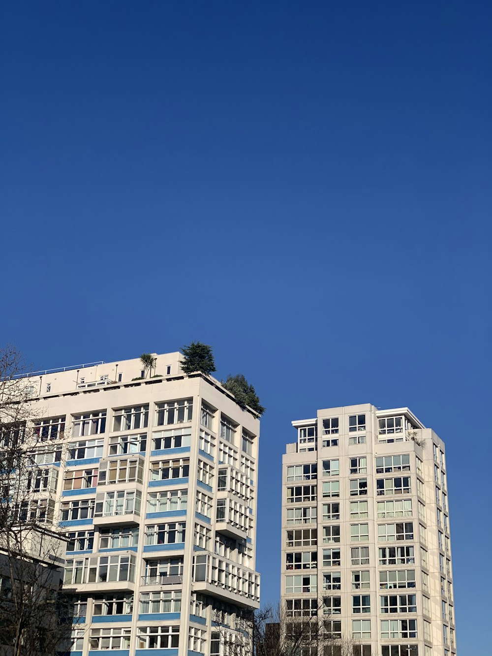 white concrete building under blue sky during daytime