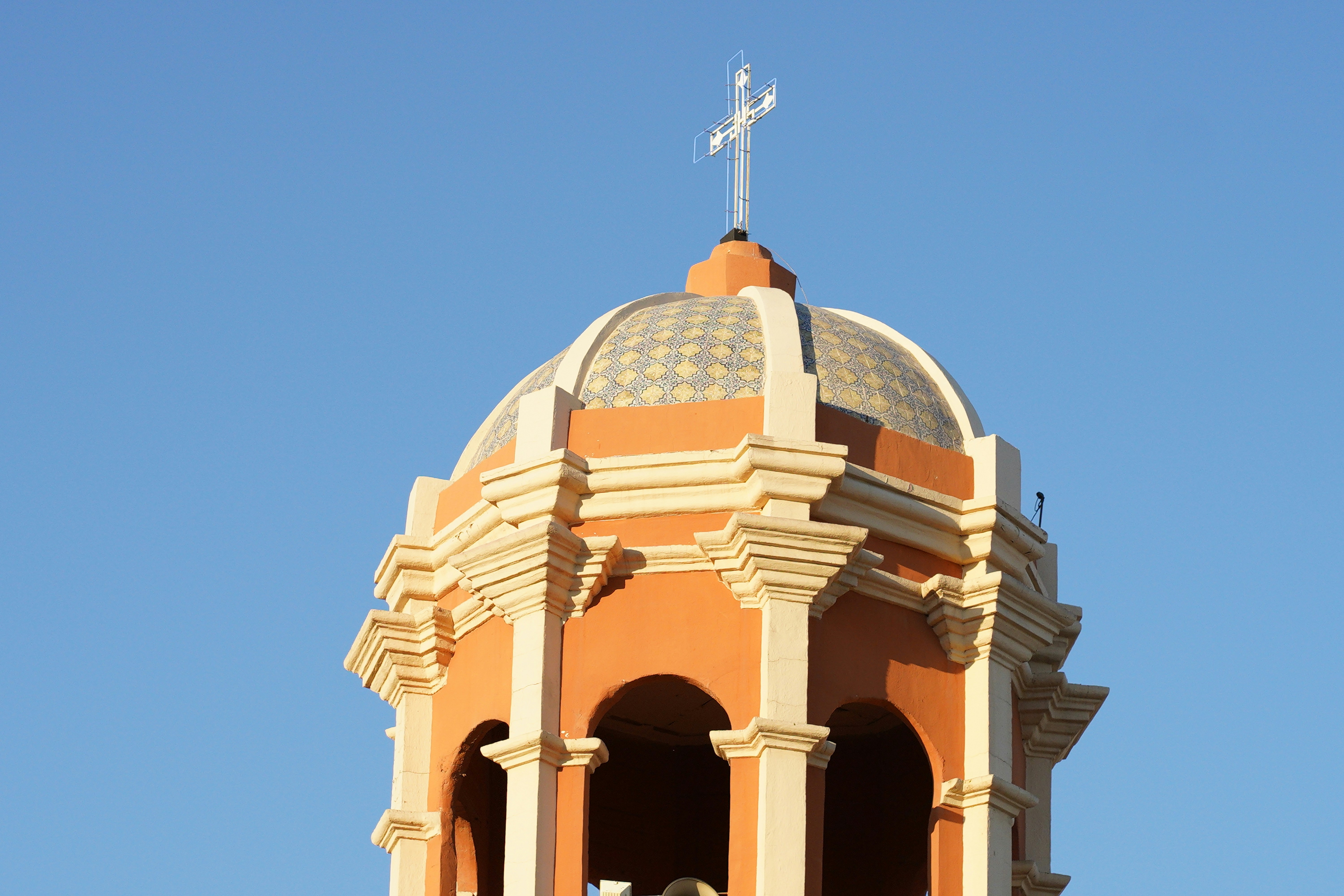 brown concrete building under blue sky during daytime
