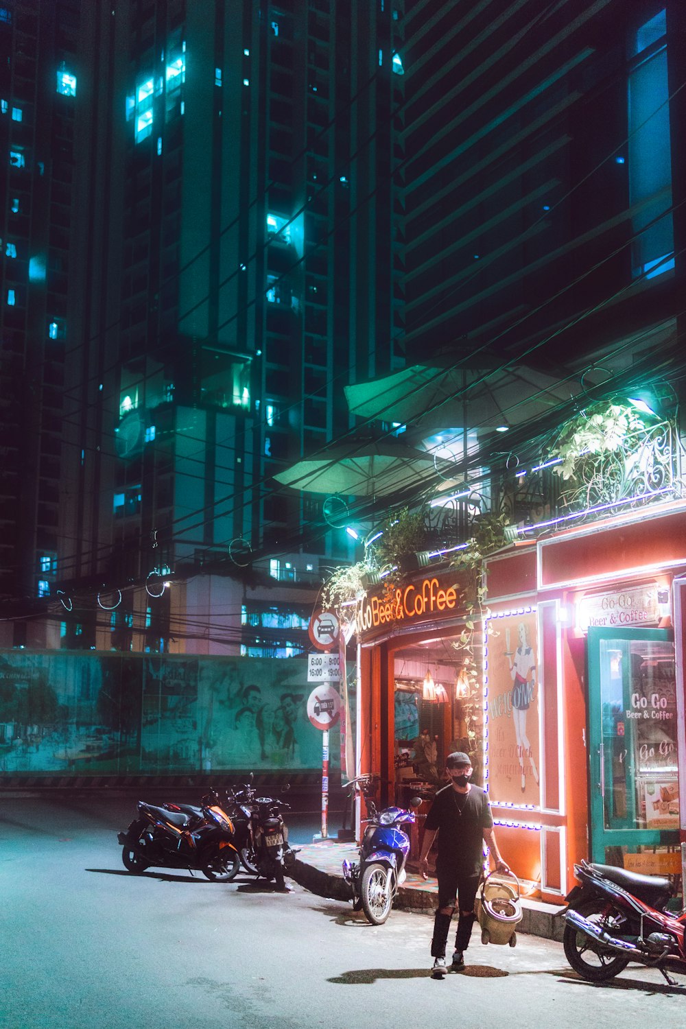 people walking on street during night time