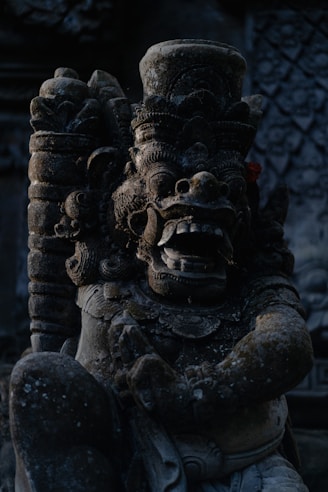 black concrete human face statue