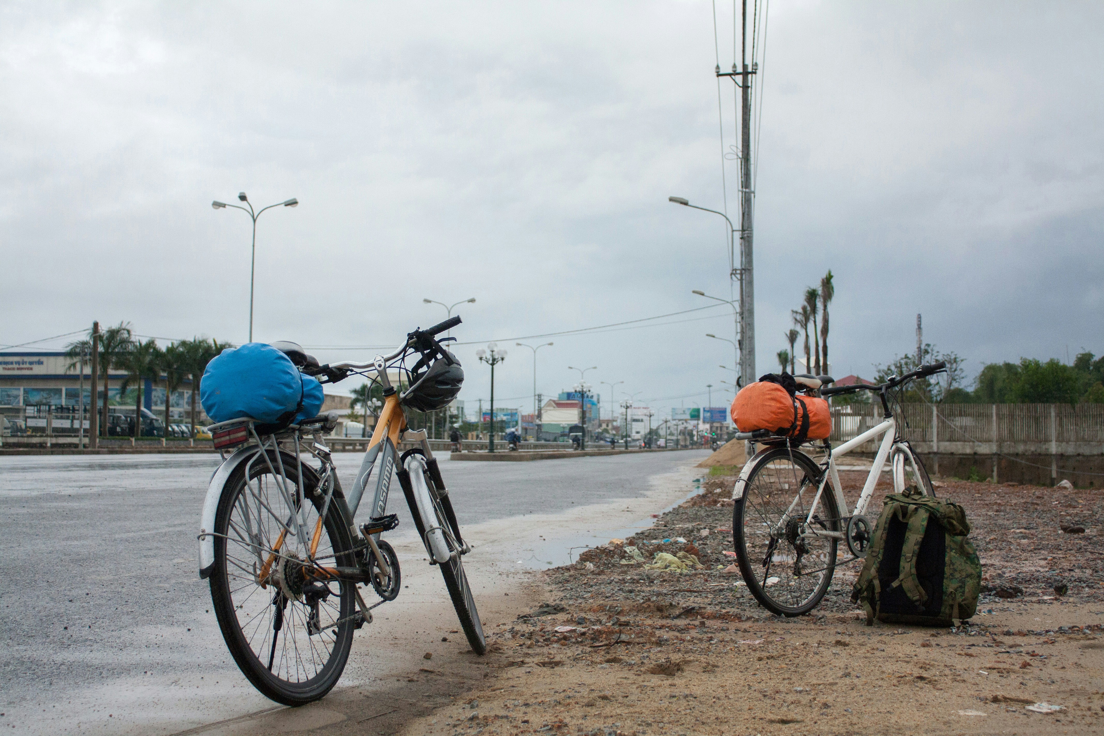 black and gray bicycle on gray concrete road