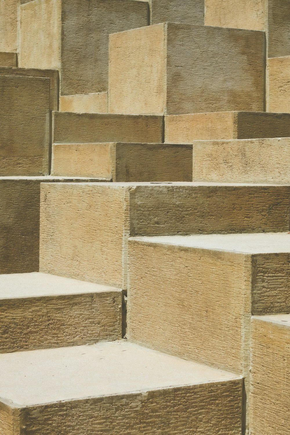 brown concrete blocks on white concrete floor