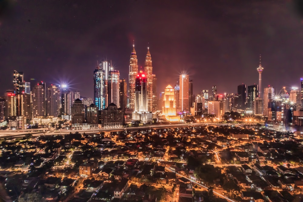 city skyline during night time