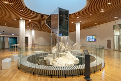 white concrete fountain in building