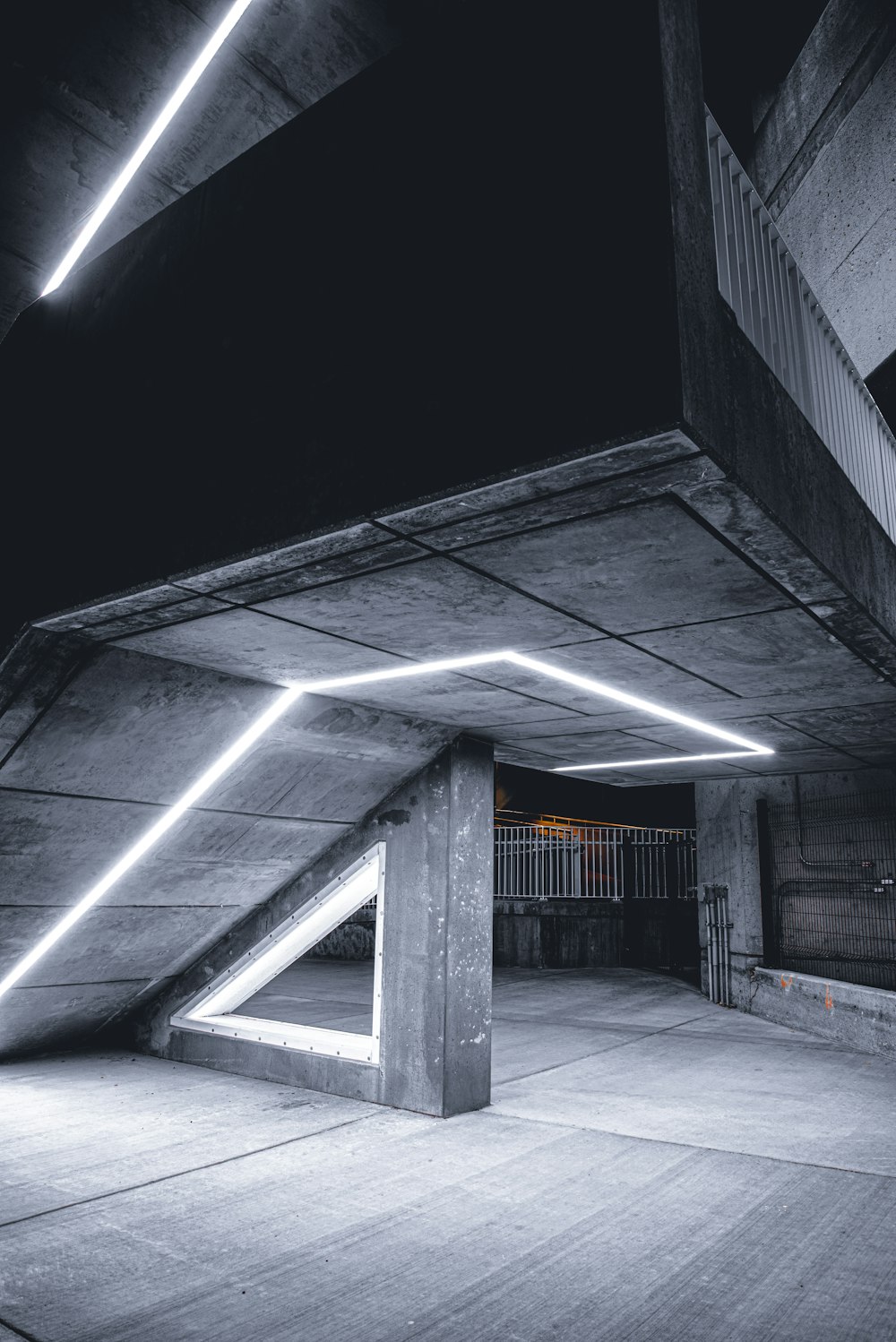 gray concrete building with glass window