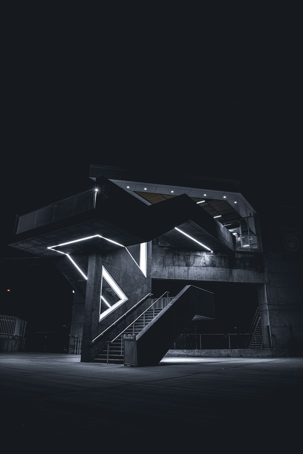 black and white building during night time