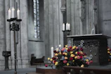 An elegant setup for a religious ceremony with flowers.