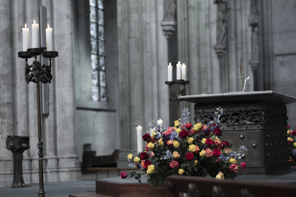 A serene altar adorned with candles, crystals, and seasonal flowers for a commitment ceremony