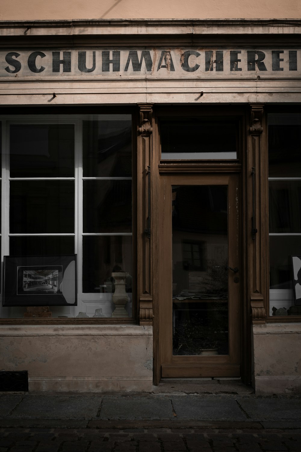 brown wooden framed glass window