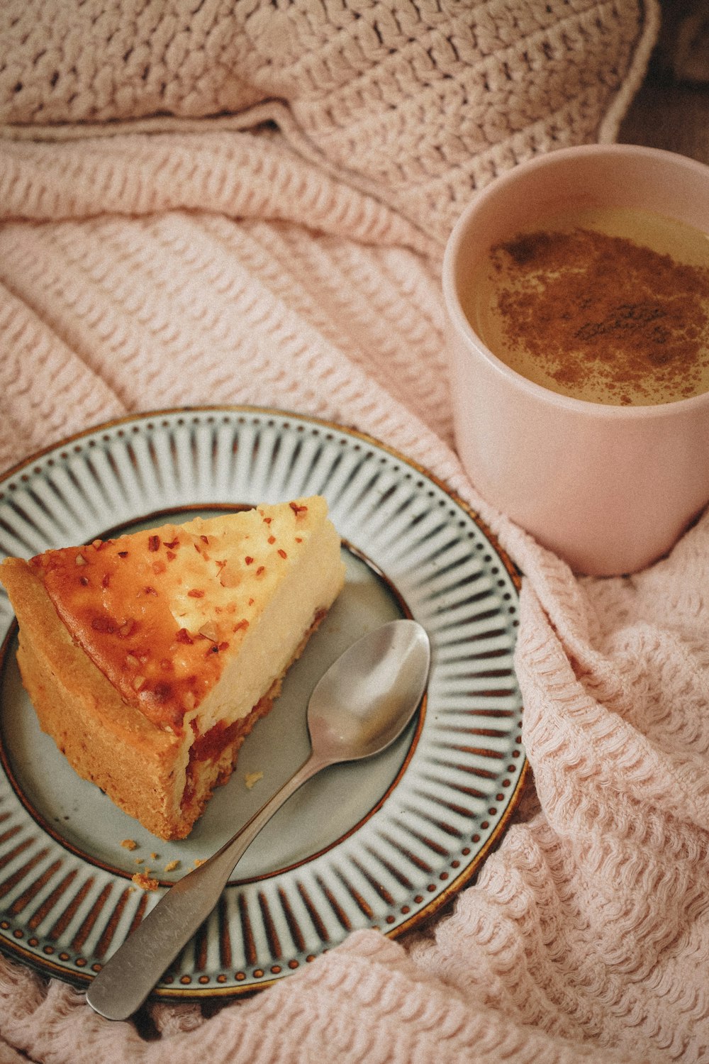 sliced bread on white ceramic plate beside white ceramic mug with coffee