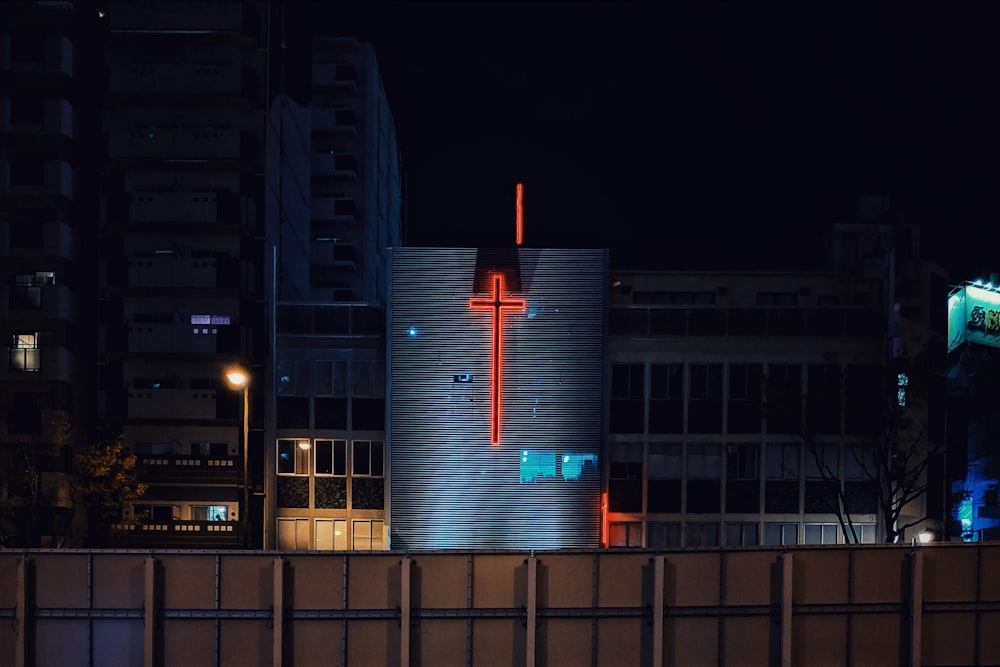 red and white building during night time