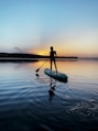 amberly martin on a paddle board