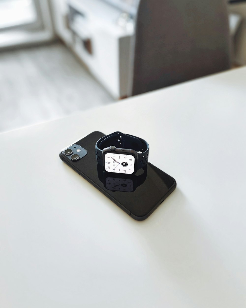 black and silver steel device on white table