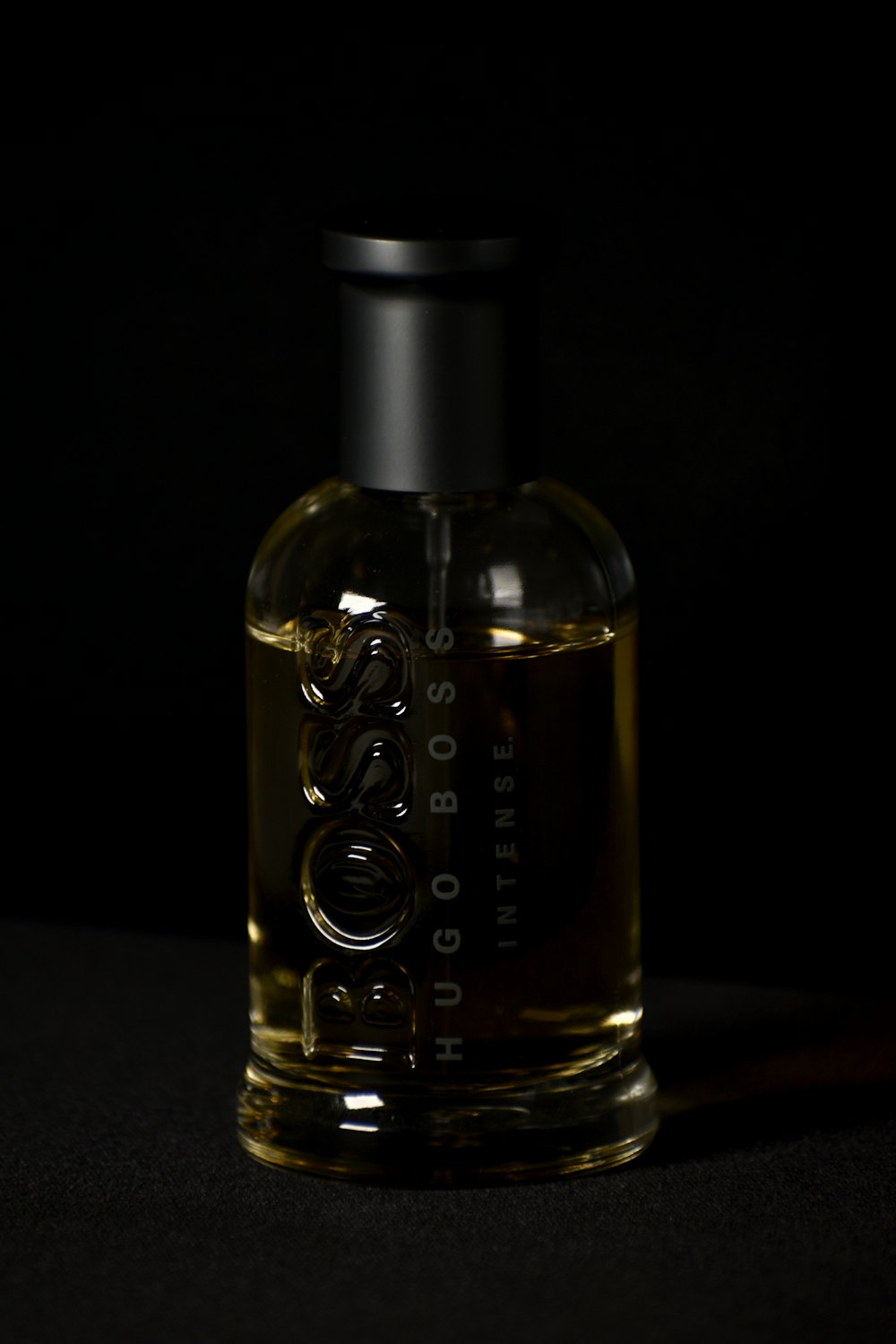 black and gold perfume bottle