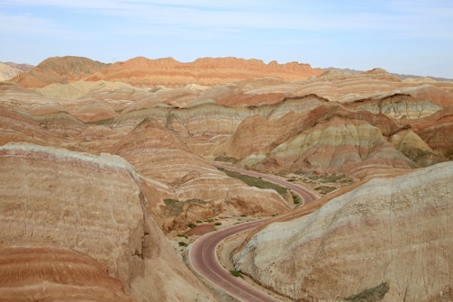 brown rocky mountain under blue sky during daytime