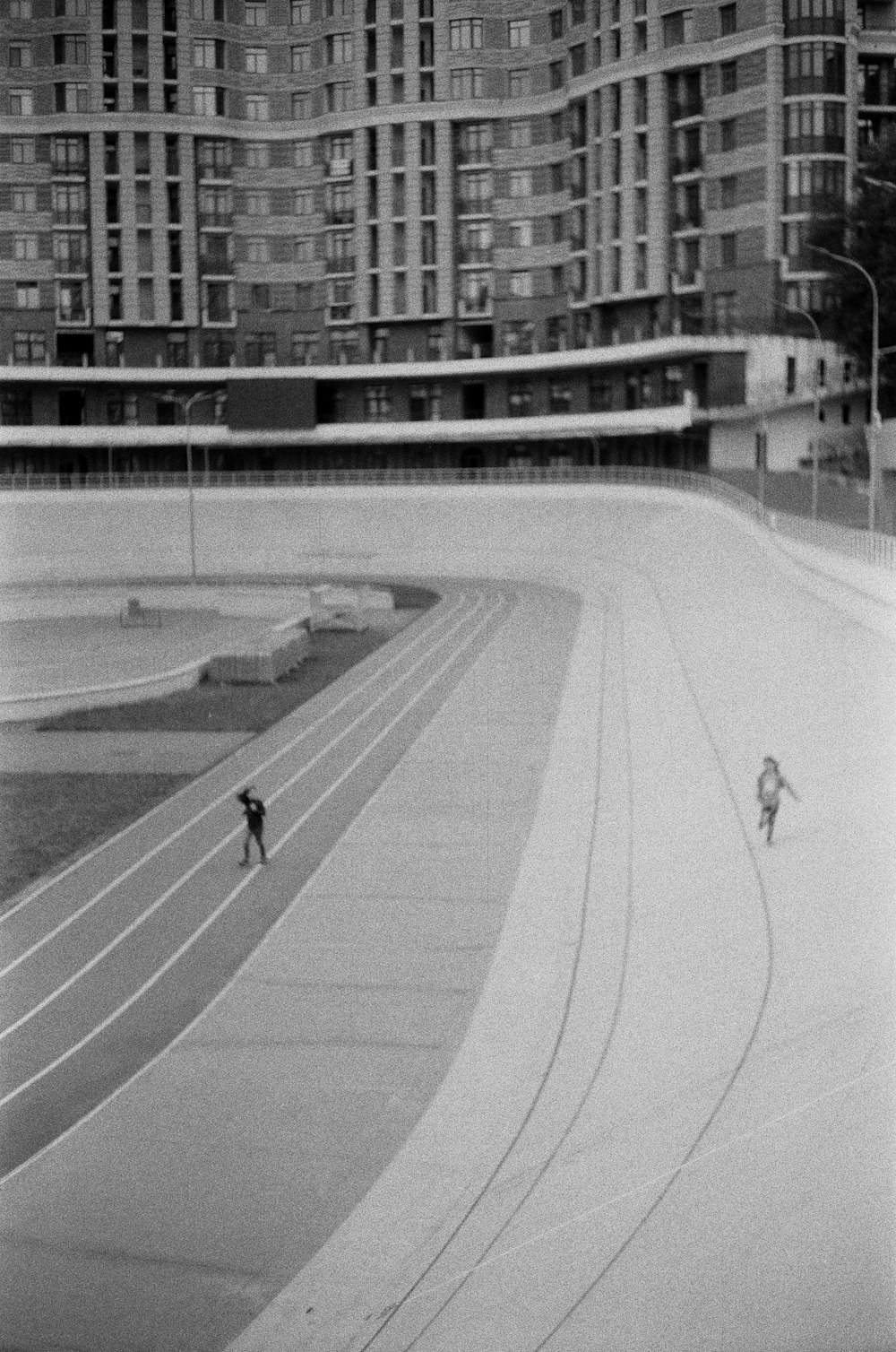 grayscale photo of people walking on road