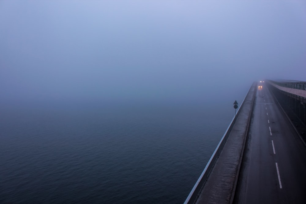 white boat on sea during daytime