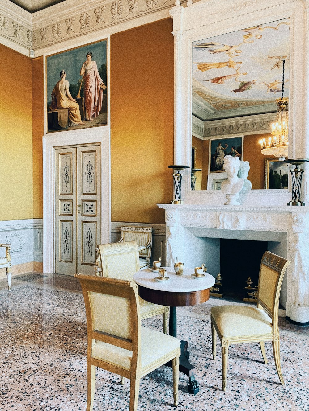 white and brown dining table and chairs