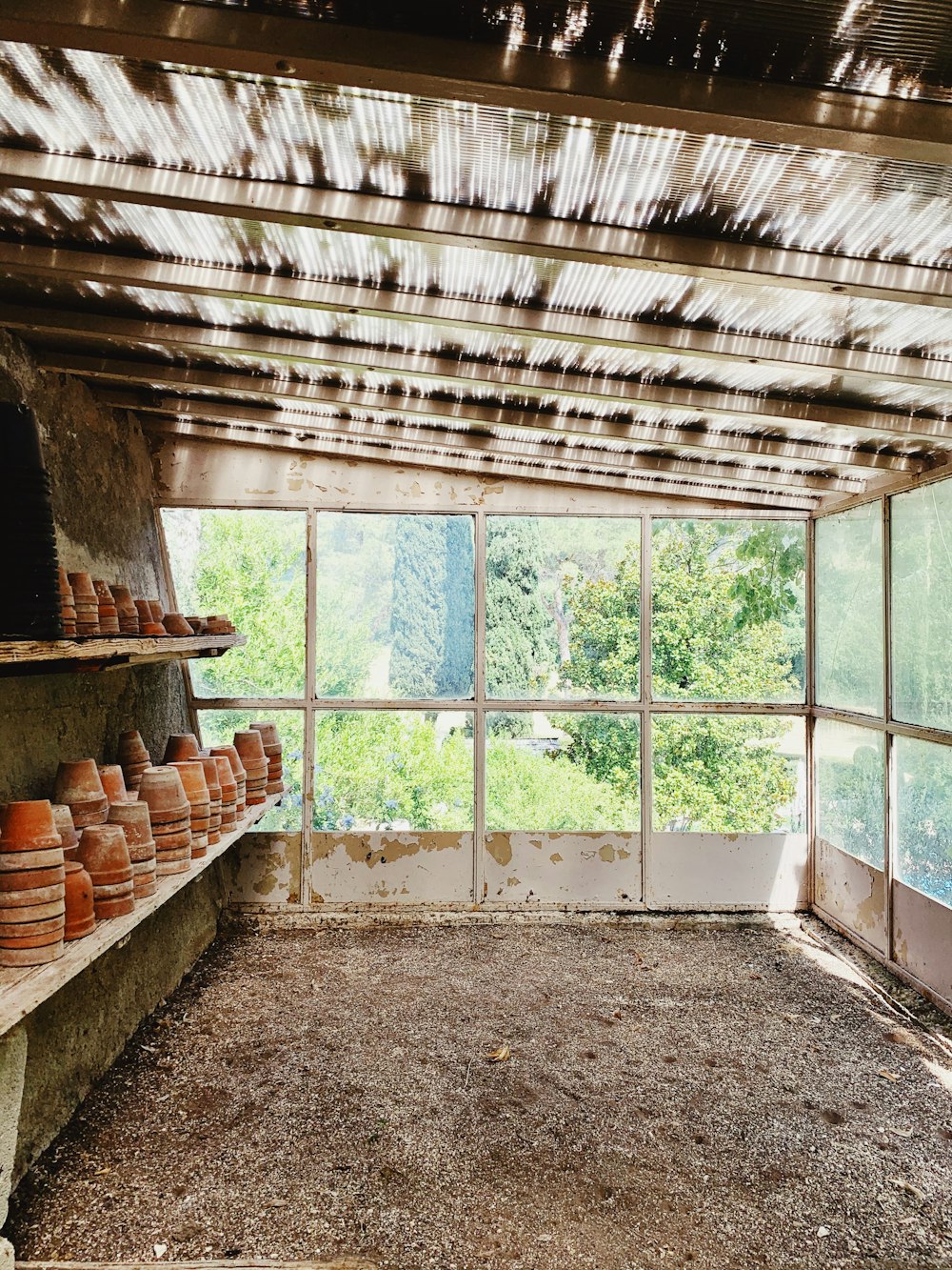 brown clay pots on window