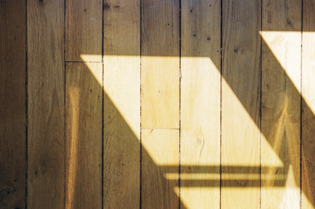 brown wooden fence with shadow