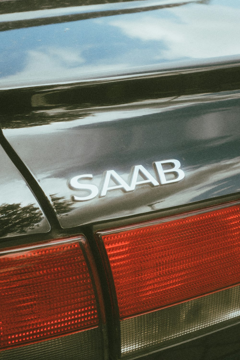 black and red car in close up photography