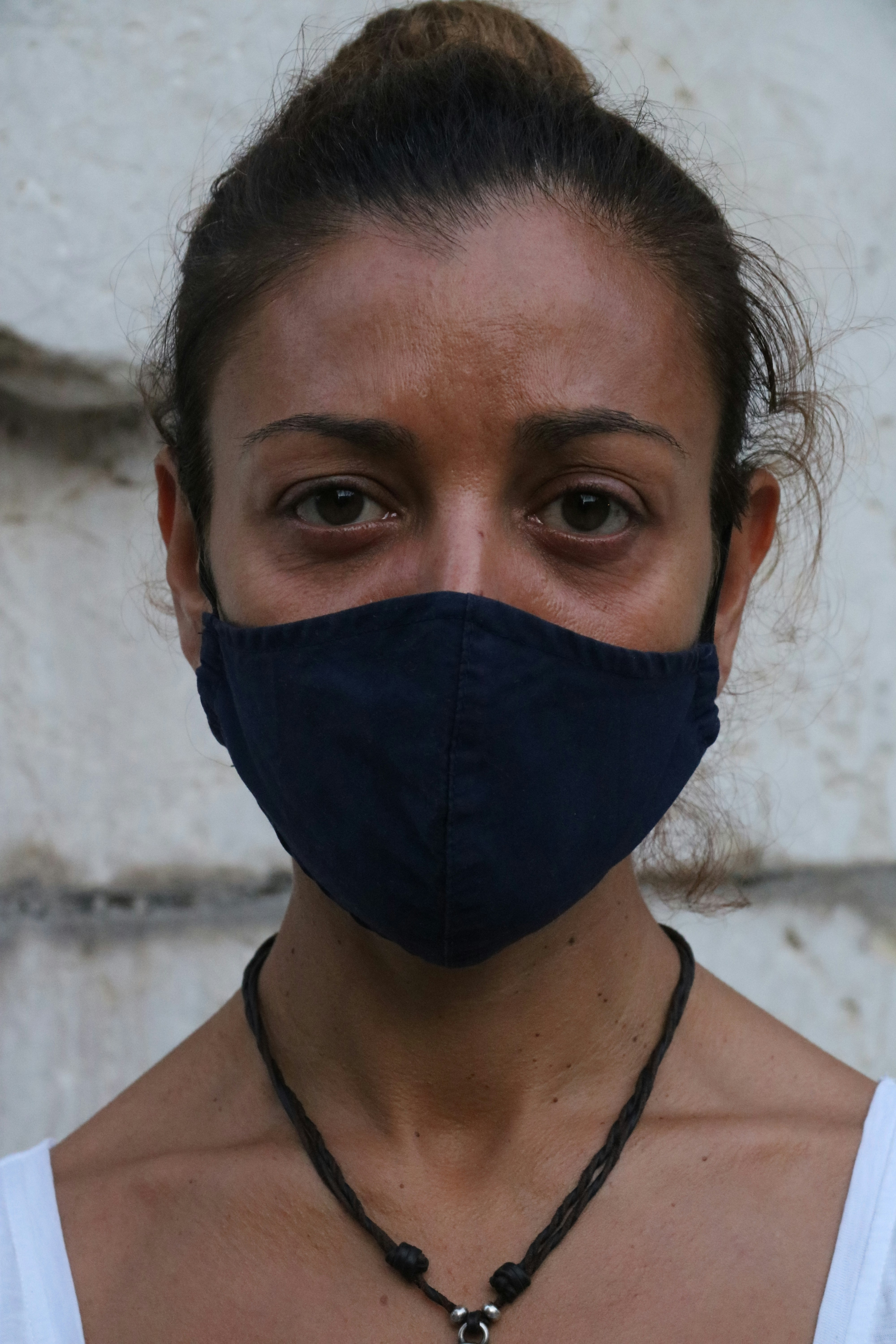 woman in black face mask