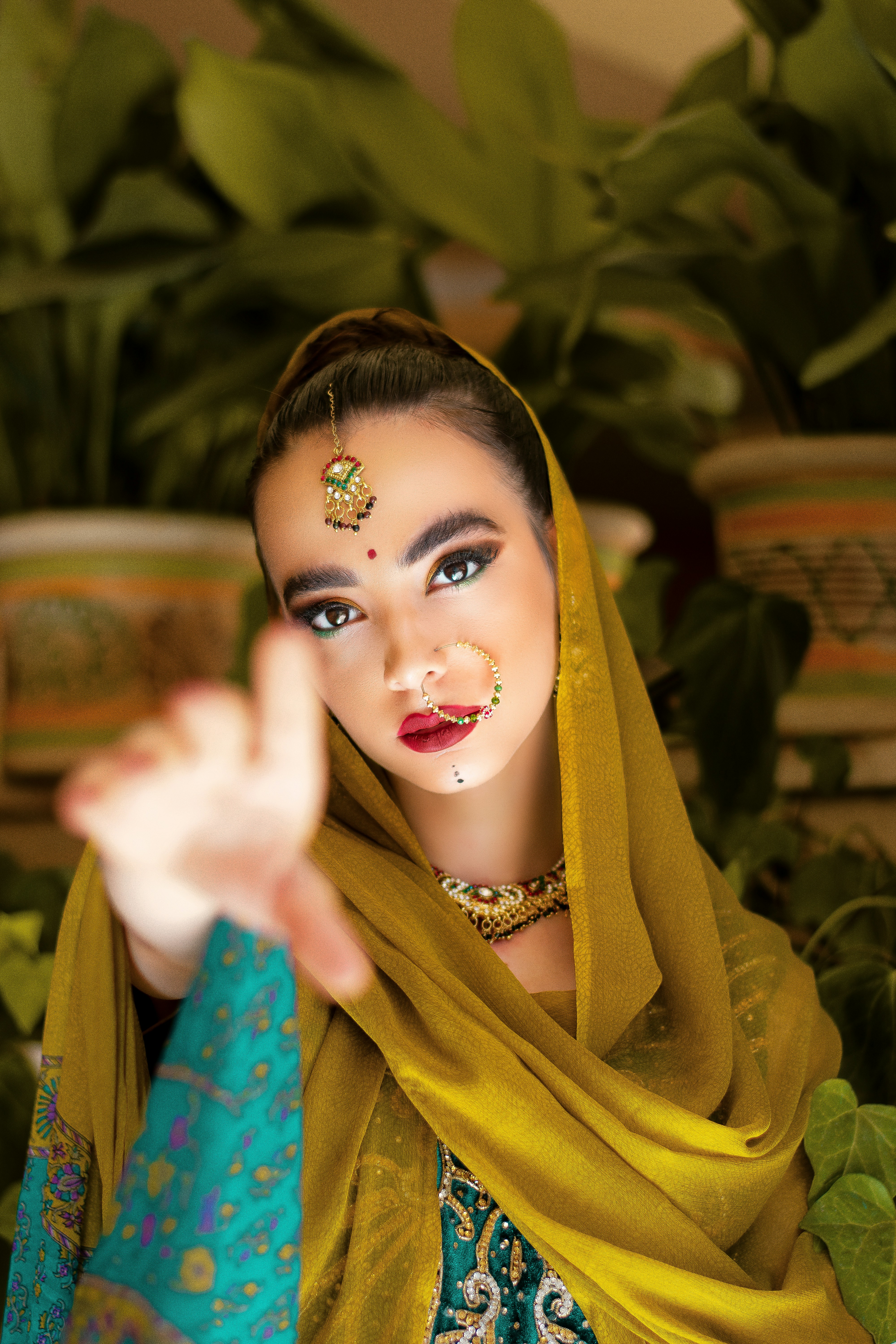 woman in green and yellow hijab