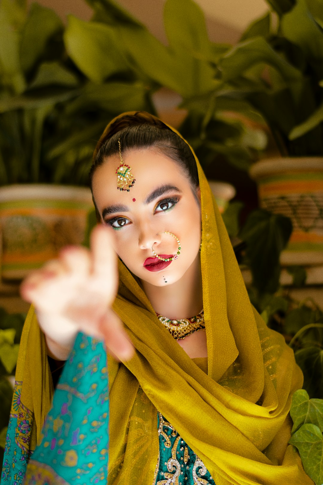 woman in green and yellow hijab