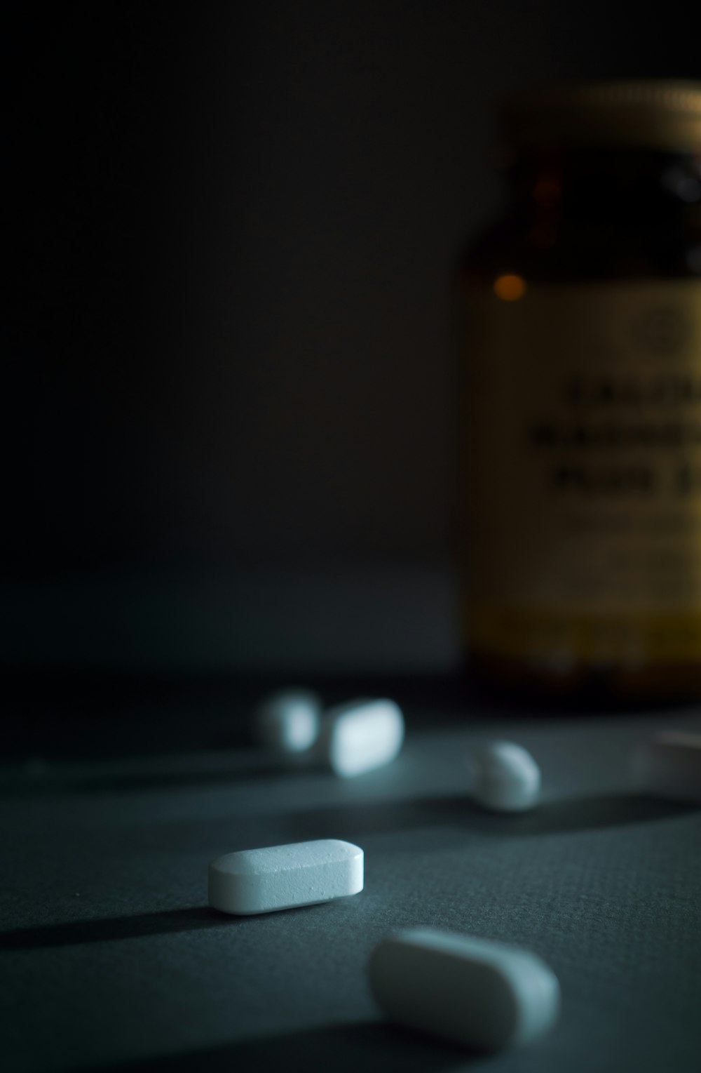 prescription bottle on gray table